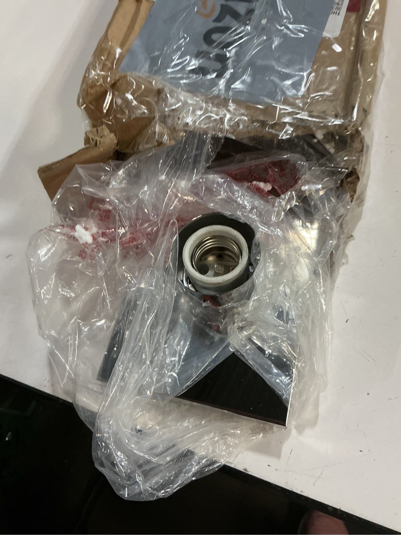 Condition photo showing Good Condition for Design House Vanity Lighting, Steel Construction, 4 Vanity Lights, Dimmable, Uses four 60W Bulbs, Polished Chrome, 24.0 In. W x 4.3 In. H x 2.0 In. D, 500892 Polished Chrome 4 Lights