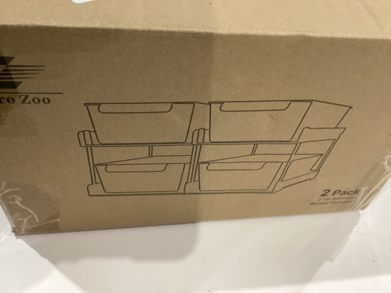 Condition photo showing As Is for 2 Pack 2-Tier Bathroom Under Sink Organizers and Storage - Clear Stackable Containers for Kitchen, Pantry, Vanity, Medicine Cabinet, Makeup, and Counter with Pull-Out Track