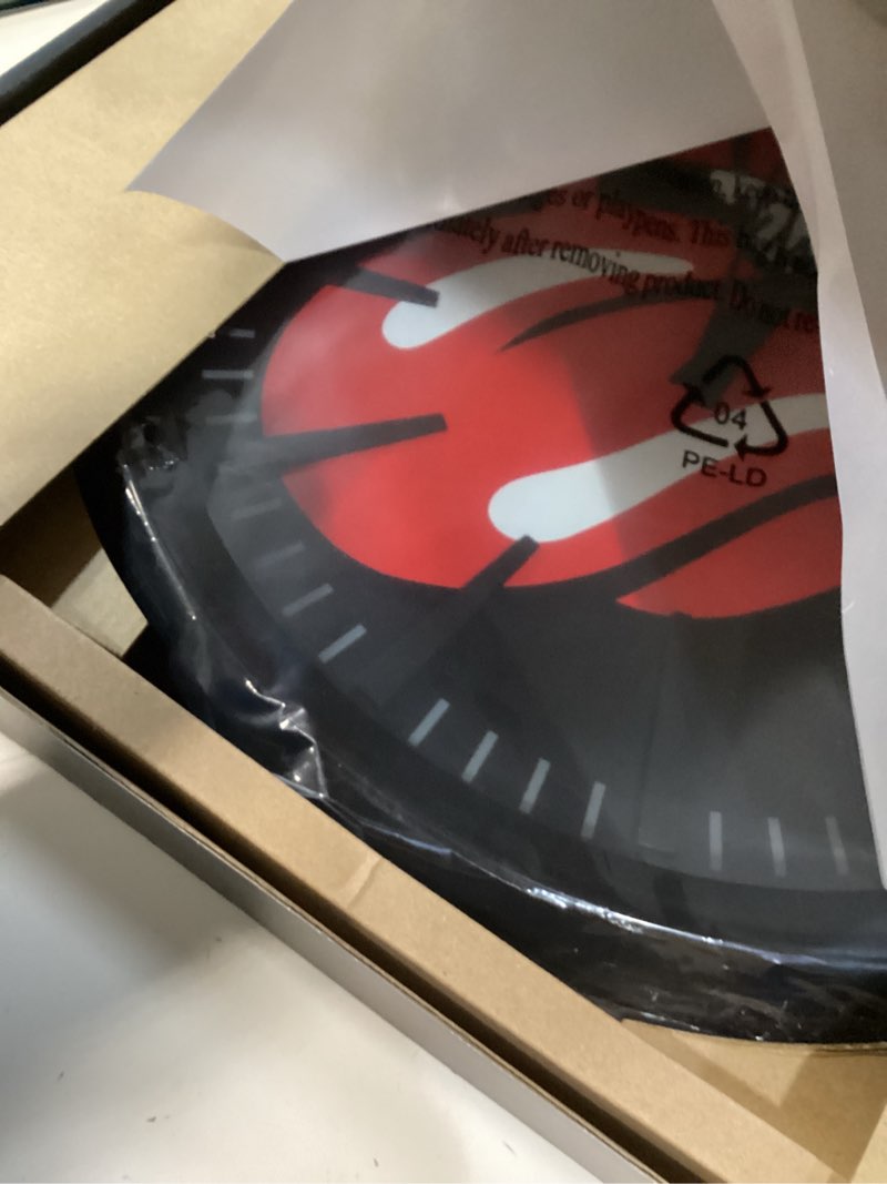 Condition photo showing New/Like New for nixon rolling stones c318500400 wall clock in black with a diameter of 40 cm