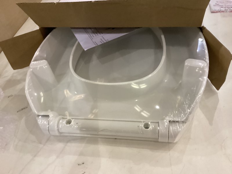 Condition photo showing New/Like New for KOHLER 25875-0 Hyten 3" Height, Elevated Soft Close Elongated Toilet Seat, Contoured Seat with Grip-Tight Bumpers, Quick-Attach Hardware, No Slam Toilet Seat, White White Elongated