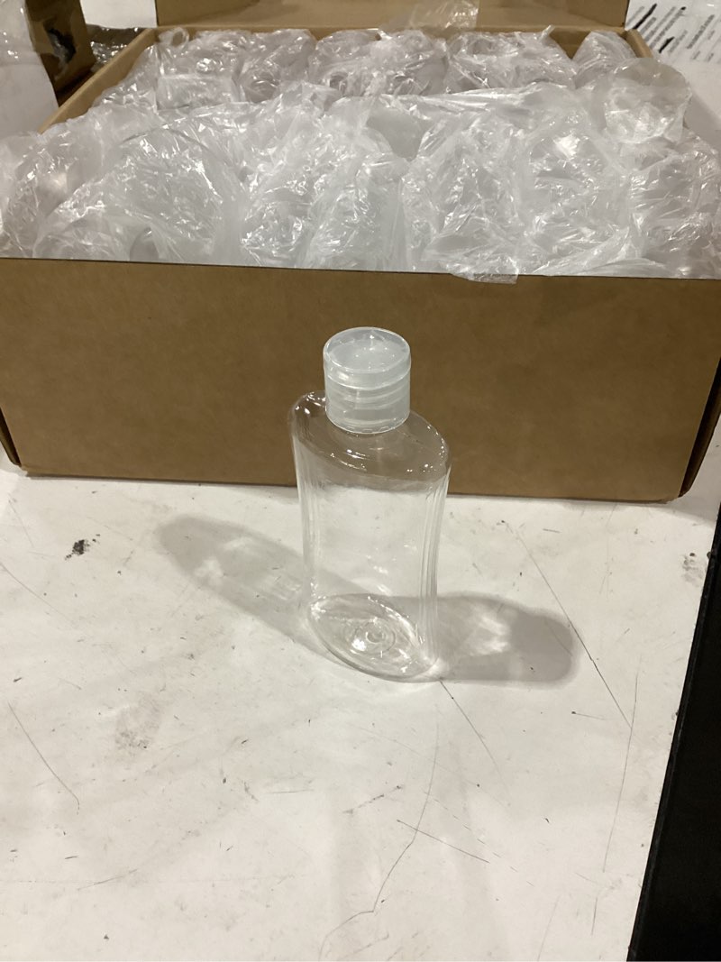 Condition photo showing Good Condition for domensi 36 pcs 3.4 oz travel bottles bulk plastic squeeze lotion bottles with flip cap small portable travel leak proof refillable empty cosmetic container for toiletries liquid shampoo(black,clear)