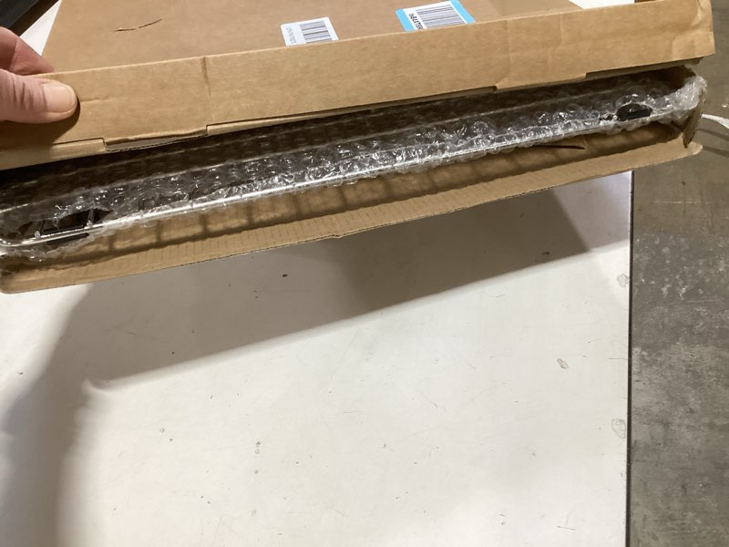 Condition photo showing New/Like New for sink bottom grid 29-1/2" x 15-9/16", centered drain with corner radius 3/8", sink protector