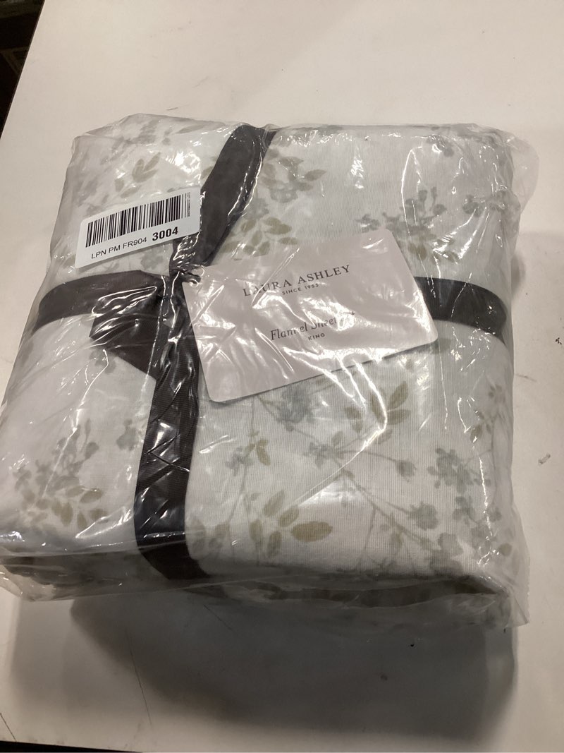 Condition photo showing New/Like New for Laura Ashley - Flannel Sheets King Size, Anti-Pilling & Wrinkle Resistant Cotton, Touchably Soft for All-Season Comfort - Bed Sheets with Matching PIllowcasess & Fitted Sheet (Fawna Grey) King Fawna Grey