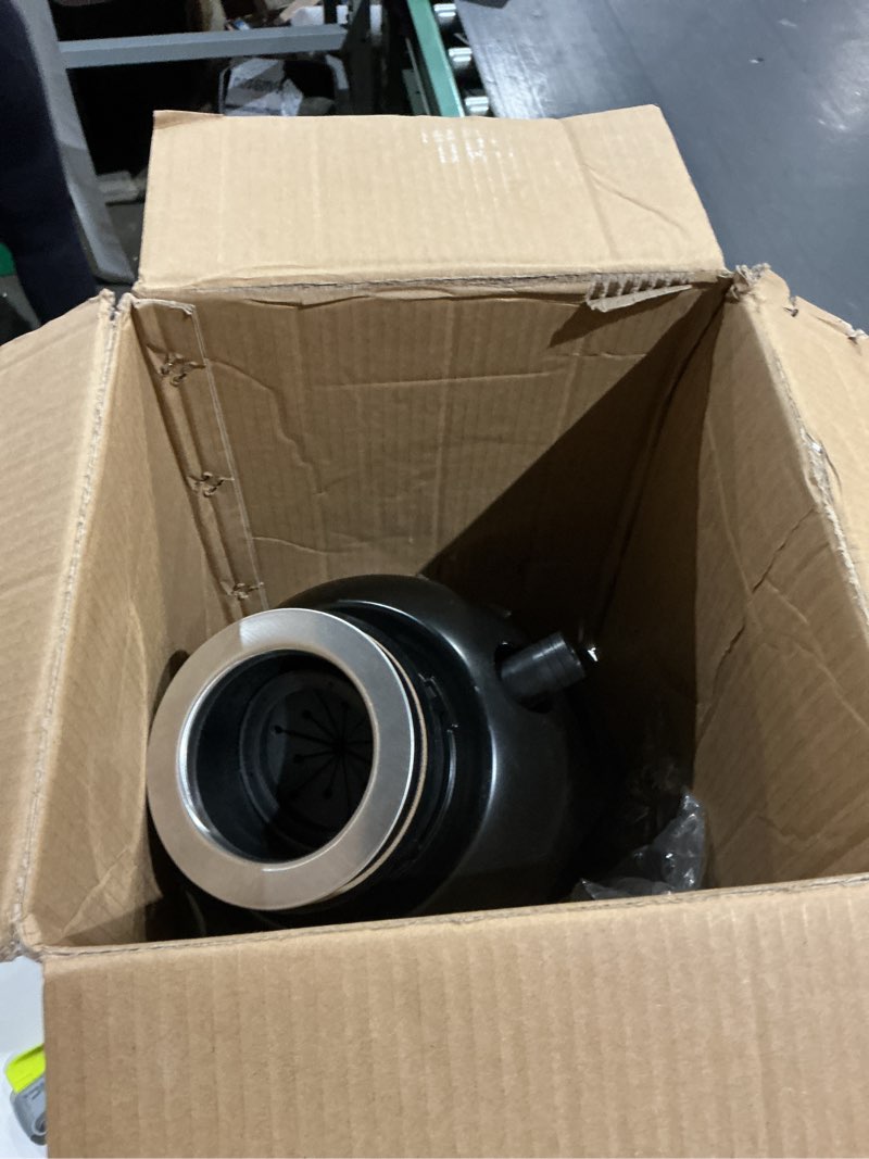 Condition photo showing As Is for kraus wasteguard 3/4 hp ultra-quiet garbage disposal with quick connect, kitchen sink drain cover, power cord and flange included, kwd100-75mbl quick-connect, plug-in 3/4 hp