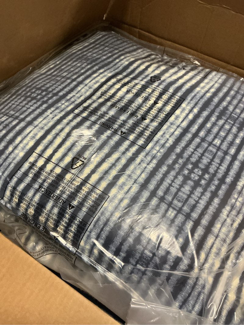 Condition photo showing Good Condition for arden outdoor deep seat cushion set (2-pack), 24 in x 24 in, weather-proof, rain-proof, fade resistant patio cushion for chair, sofa, and couch blue shibori stripe polyfill blue shibori stripe 2 pack