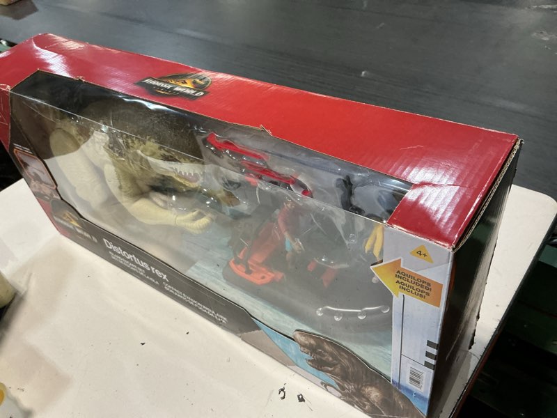 Condition photo showing Good Condition for jurassic world rebirth storypack with raft, villain dino1, adult, child & aquilops, island escape