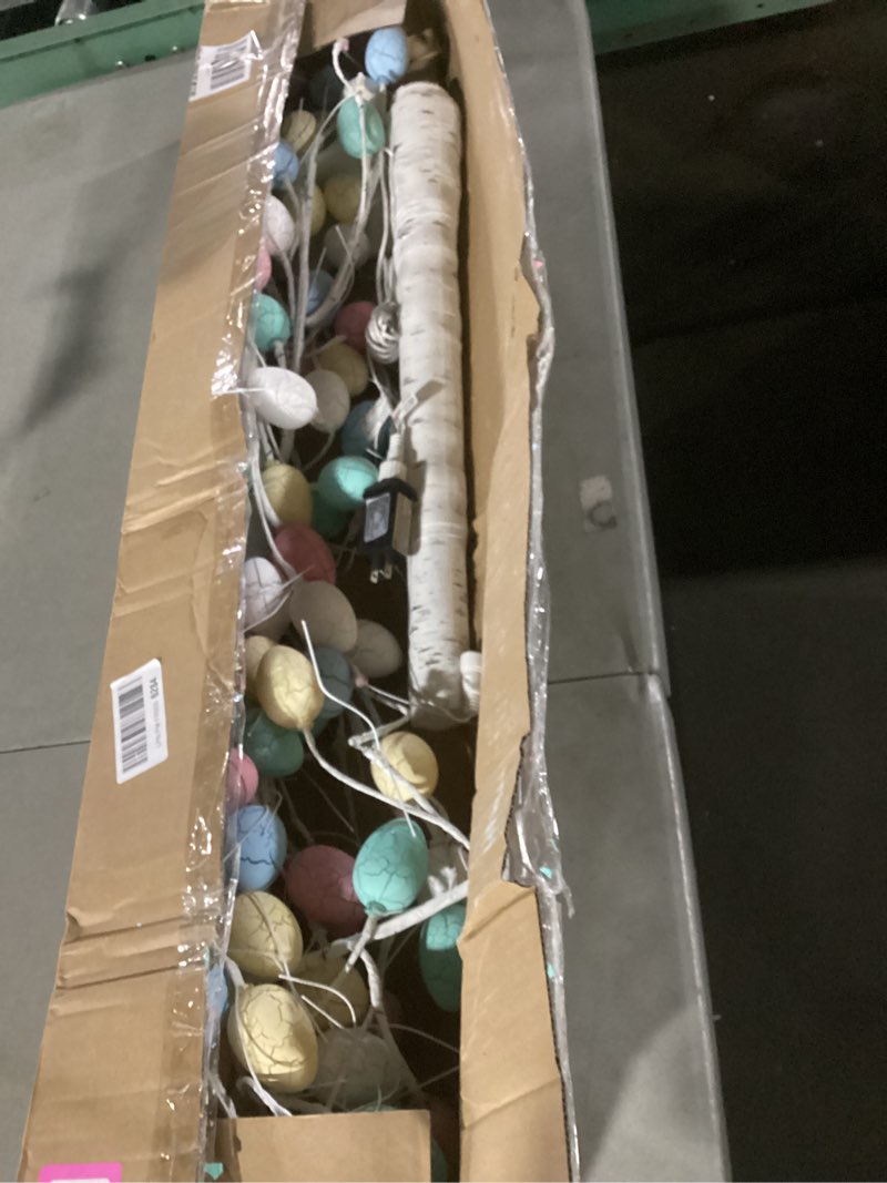 Condition photo showing As Is for nearly natural 6ft. pre-lit artificial easter twig tree with 96 egg shaped led ornaments