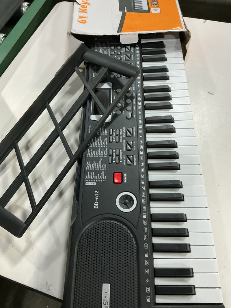 Condition photo showing Good Condition for 61 key keyboard piano, portable electronic keyboard piano for beginners with speakers, microphone, sheet music stand, 100 voices, 100 rhythms, digital music keyboard built-in speakers - black