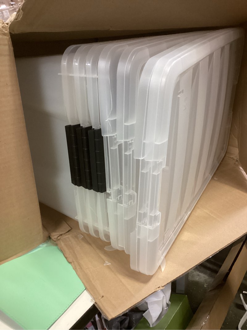 Condition photo showing Good Condition for IRIS USA 72 Qt Stackable Plastic Storage Bins with Lids, 4 Pack - BPA-Free, Made in USA - See-Through Organizing Solution, Latches, Durable Nestable Containers, Secure Pull Handle - Clear Clear 72 Qt 4 Pack