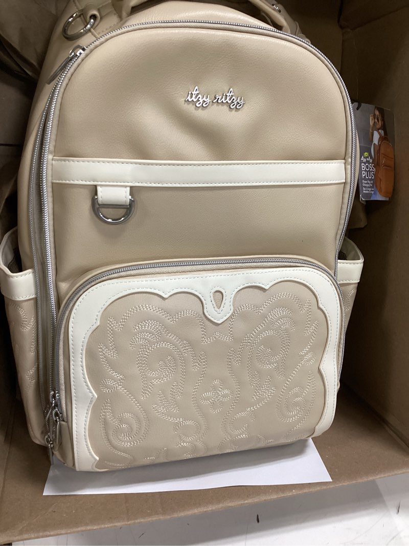 Condition photo showing Good Condition for itzy ritzy diaper bag backpack – large capacity boss plus baby backpack diaper bag featuring 19 pockets, changing pad, stroller clips, and comfortable backpack straps, oat