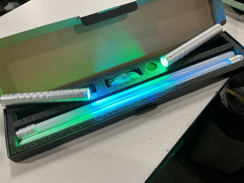 Condition photo showing New/Like New for oomyeh lightsaber kids toy alloy hilt update 15 colors with 3 modes type-c rechargeable 2 in 1 dueling light saber for kids and adults children's day (2 pack silver) 15 colors silver