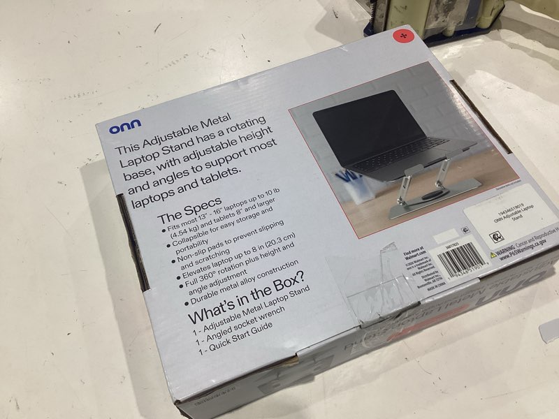 Condition photo showing As Is for onn adjustable metal laptop stand