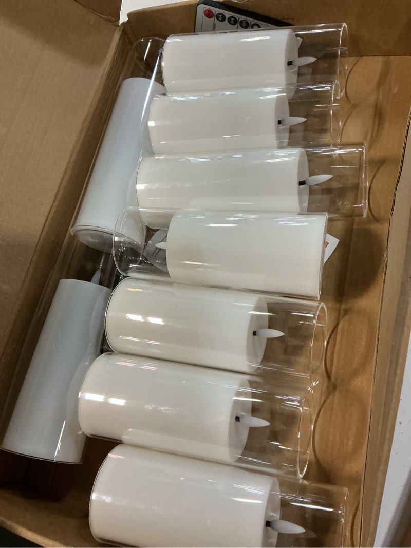 Condition photo showing Good Condition for kakoya flickering flameless candles battery operated with remote and 2/4/6/8 h timer acrylic led pillar candles pack of 9 (appr d2.3"xh5.5"6.5"7.5")with realistic 3d wick candles for home decor(white) white-1