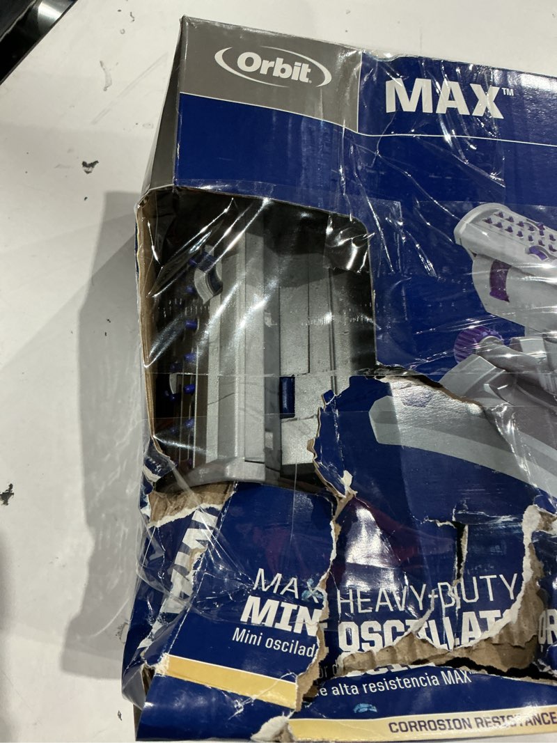 Condition photo showing As Is for orbit max 3900-sq ft oscillating sled lawn sprinkler