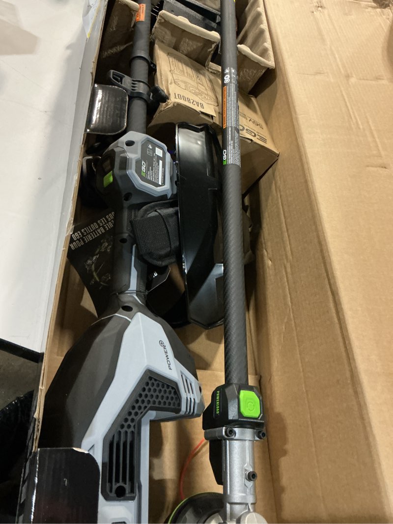 Condition photo showing As Is for ego power+ multi-head system with line iq, powerload 56-volt 17-in straight shaft attachment capable battery string trimmer 5 ah (battery included) (charger included)
