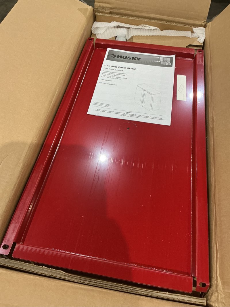 Condition photo showing As Is for gauge steel wall mounted garage cabinet in red 