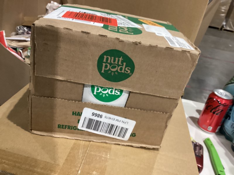 Condition photo showing New/Like New for Nutpods Hazelnut Flavored Almond + Coconut Creamer, Unsweetened, Non Dairy, 11.2 Fluid Ounces (Pack Of 12)
