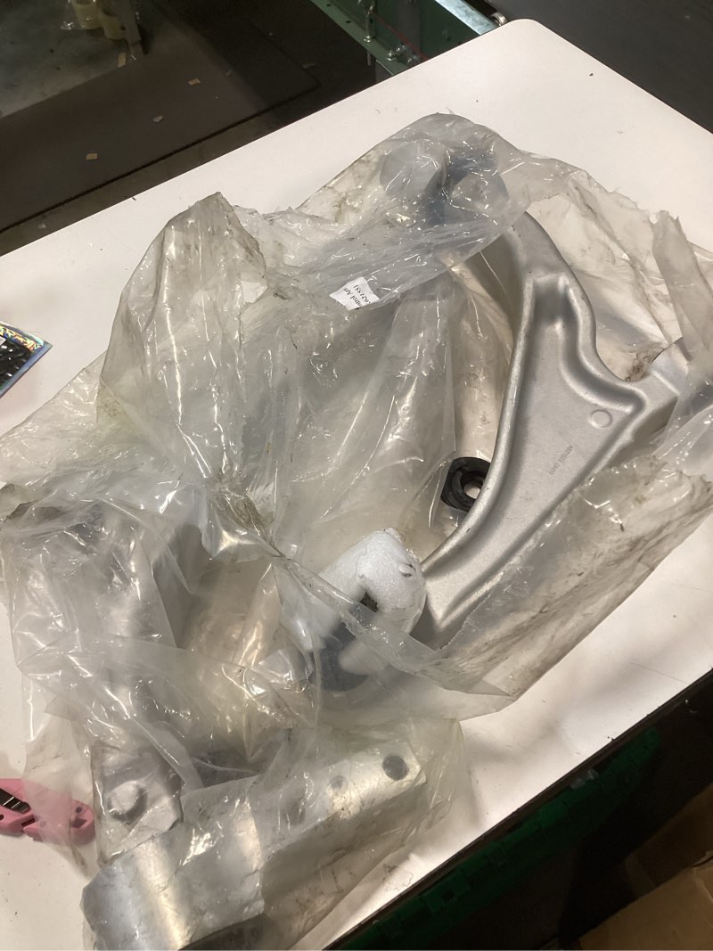 Condition photo showing As Is for Dorman: 520-511 - Suspension Control Arm and Ball Joint Assembly ( count:2 )