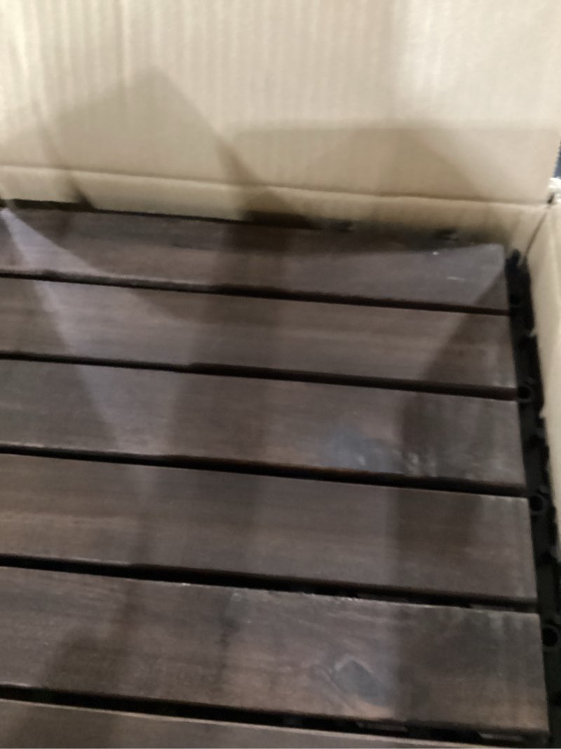 Condition photo showing New/Like New for Idzo Interlocking Deck Tiles 9.6 SQFT - 10PCS Waterproof Acacia Wood Patio Tiles, Flooring Tiles for Indoor and Outdoor - Decking Stripe Pattern, 11.81 x 11.81 x 0.91 Inches, Dark Brown Dark Brown Striped Pattern