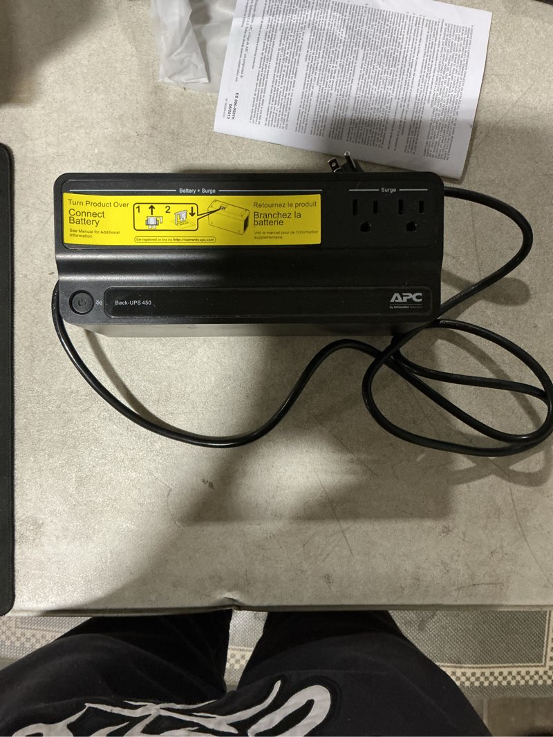Condition photo showing As Is for apc ups 450va battery backup surge protector, bn450m backup battery power supply, 6 outlets