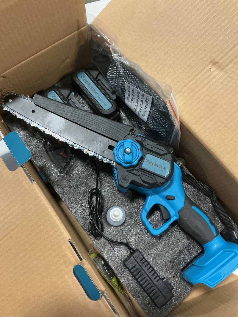 Condition photo showing New/Like New for 8 Inch Electric Chainsaw Cordless With Auto Oiler, Seniors Friendly Batteries Powered Hand held Chain saw Kit, Automatic Chain Tensioning & Auto Oiler For Tree Branches, Courtyard, And Garden 8 Inch MAX Kit - TOOL FREE