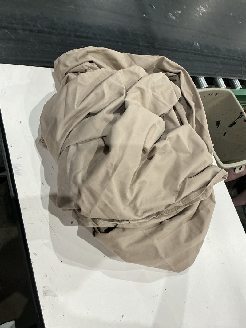 Condition photo showing As Is for style selections tan polyester patio furniture cover for dining table (round)