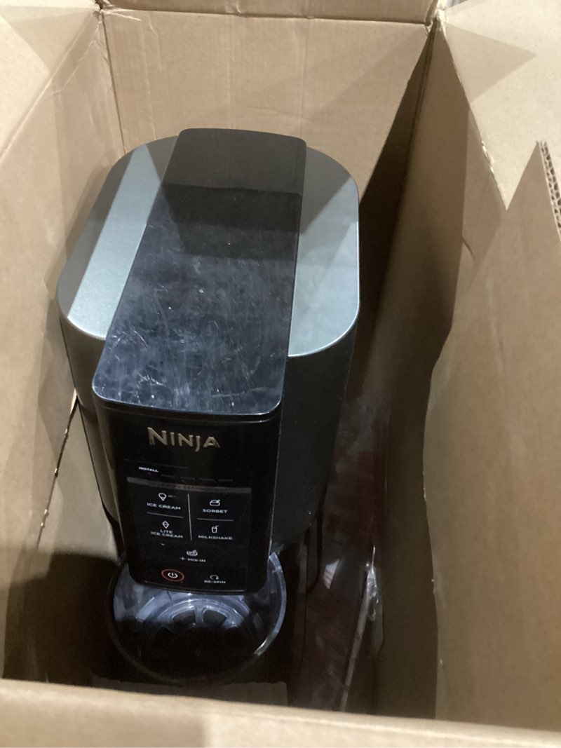 Condition photo showing As Is for ninja creami deluxe ice cream maker, treats and frozen desserts, sorbet, milkshakes, yogurt and more, 11-in-1 programs, xl capacity, includes two 24-oz family-size tubs, silver, nc501