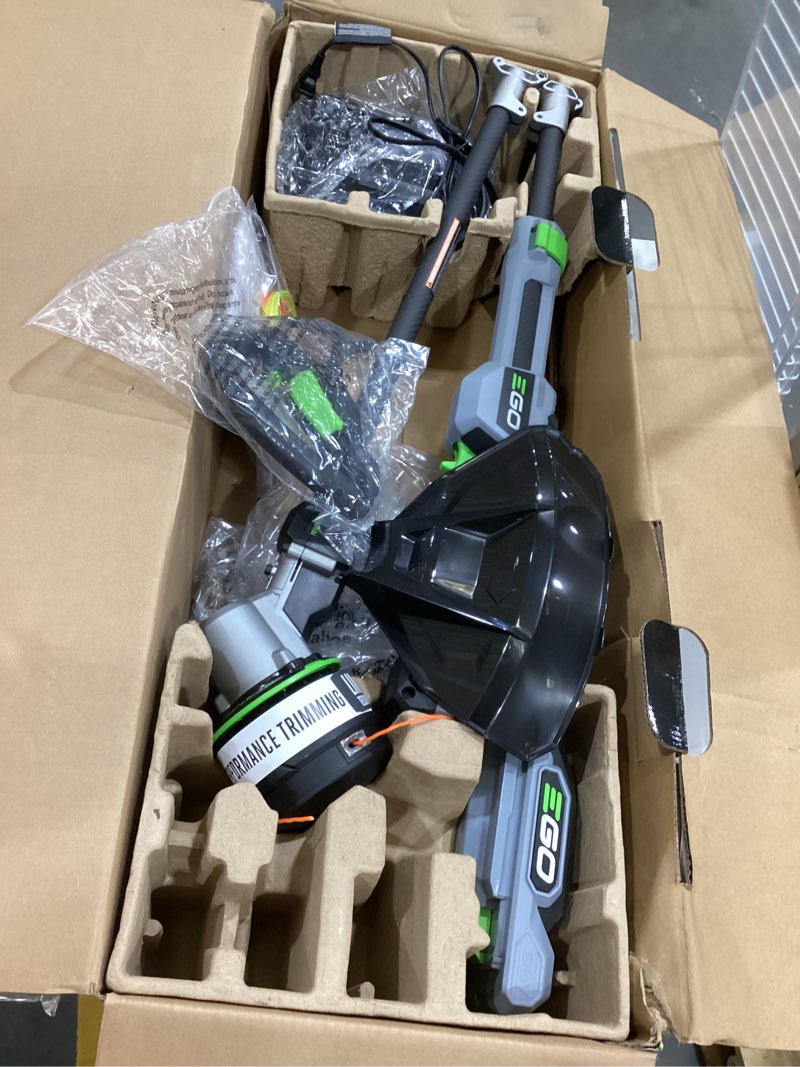 Condition photo showing As Is for ego power+ line iq with powerload st1623t 16 in. 56 v battery string trimmer kit (battery & charger) w/ telescopic shaft & 4.0 ah battery
