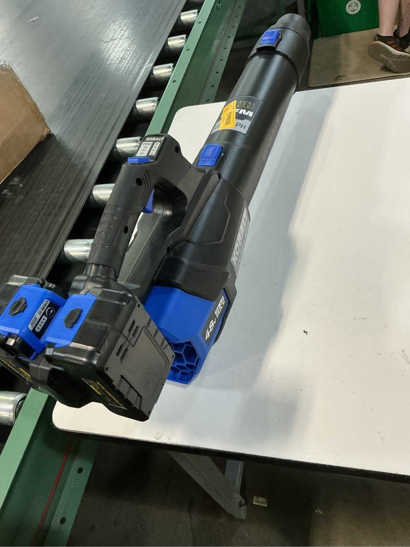 Condition photo showing As Is for kobalt 48v max (24vx2) 600 cfm / 150 mph handheld leaf blower kit, (2) 4.0ah batteries and charger included