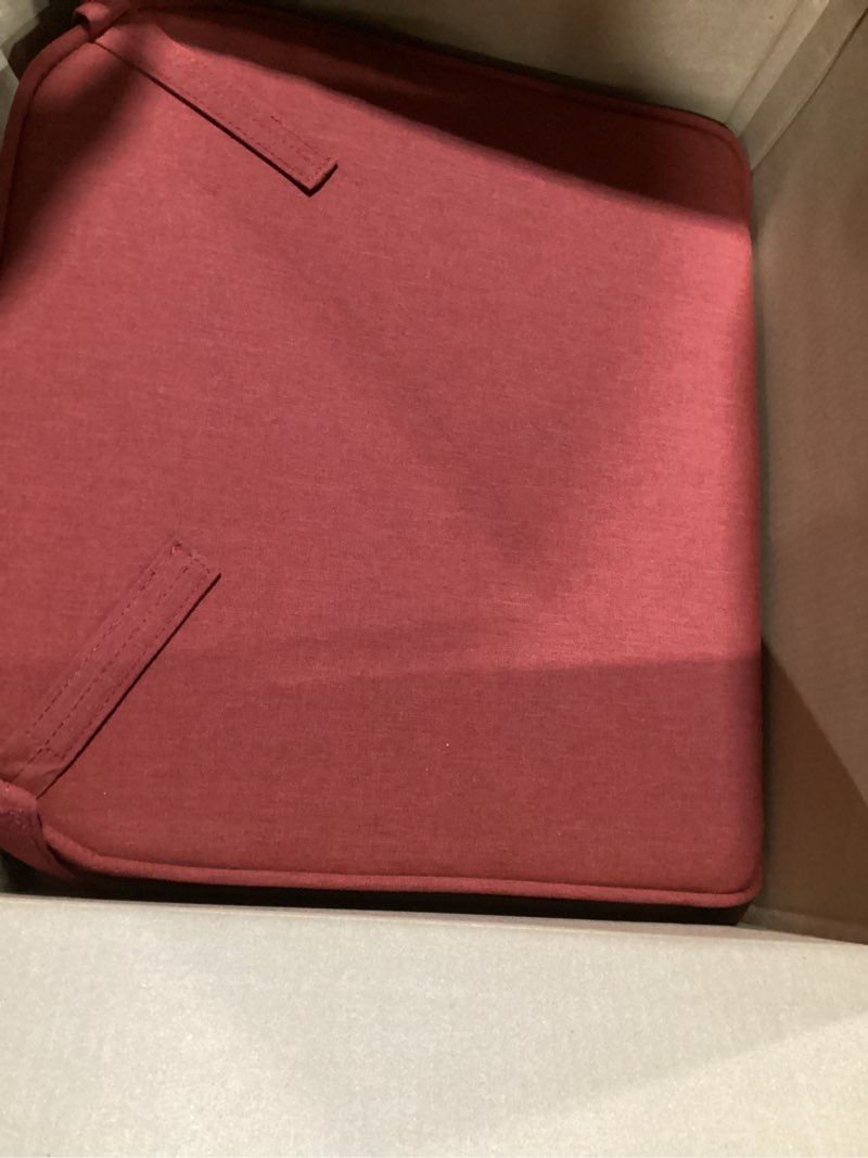 Condition photo showing As Is for arden 20x19 luxury foam outdoor double welted round back seat cushion, made with profoam, performance fabric, rain-proof, fade resistant, chili pepper red woven solid 20 x 19 rounded back seat cushion chili pepper red woven solid