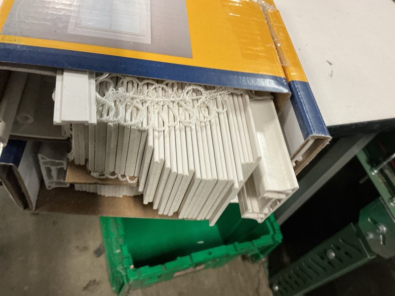 Condition photo showing As Is for levolor trim+go 2-in slat width 23-in x 64-in cordless white faux wood room darkening horizontal blinds