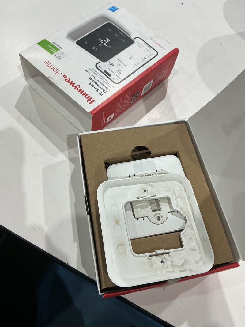 Condition photo showing As Is for honeywell home t5 smart with white bezel thermostat: 1-year warranty, plastic, 4.06" height, no battery required