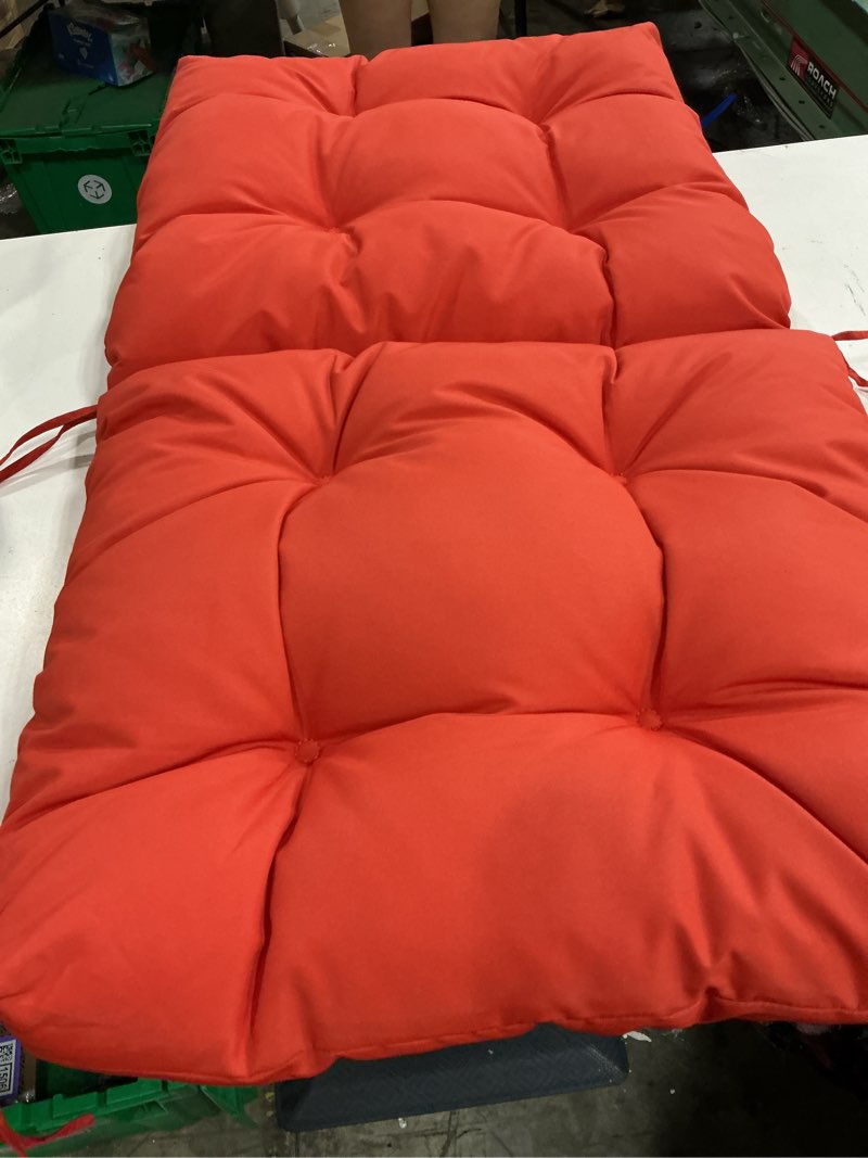 Condition photo showing Good Condition for red, tufted qilloway outdoor chair cushion features fabric ties for securing it to furniture