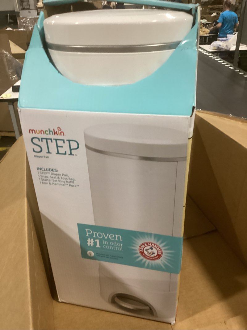 Condition photo showing New/Like New for munchkin® step™ diaper pail powered by arm & hammer, #1 in odor control, award-winning, includes 1 snap, seal & toss™ bag, 1 starter refill ring, and 1 puck™ baking soda cartridge