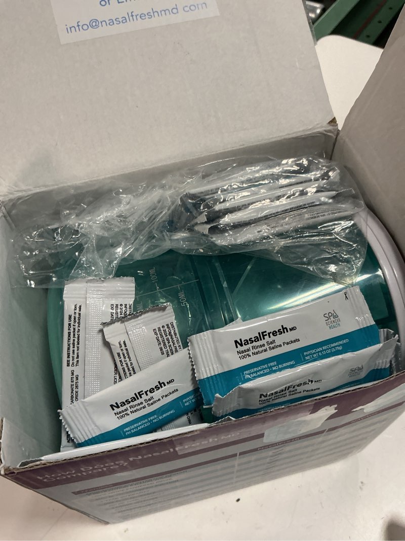 Condition photo showing As Is for nasalfresh md - dual powered nasal irrigation system nasal rinse and wash - sinus decongestant relief system w/ 30 saline packets - rechargeable - 2 sets of nose pillows - snoring remedy