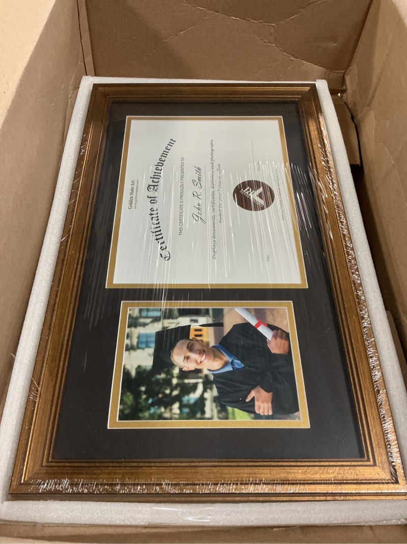 Condition photo showing New/Like New for golden state art, 11x19.5 diploma frame for 8.5x11 certificate and 5x7 picture - 2 openings - black with gold trim and burgundy accents - navy blue over gold double mat - real glass - wall mount