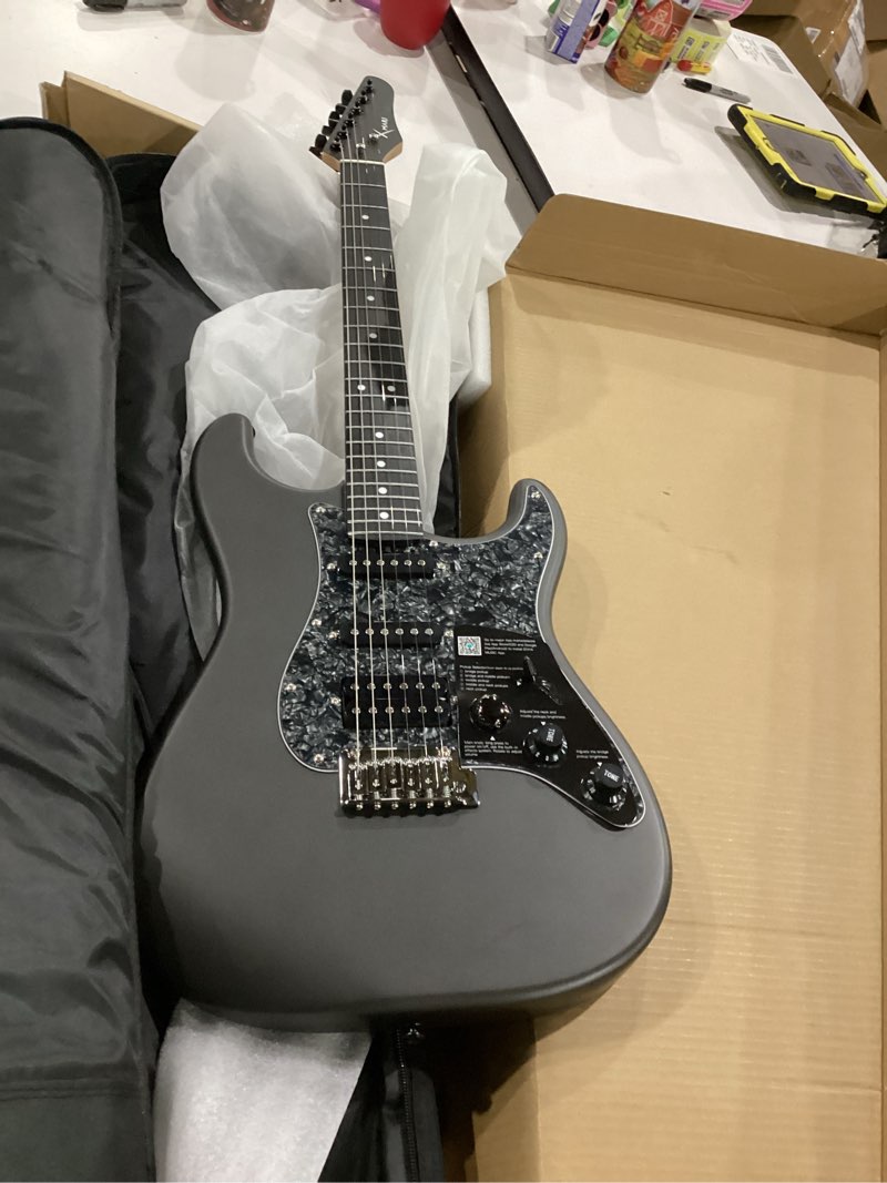 Condition photo showing New/Like New for enya xmari smart electric guitar with built-in dsp effects, 4 presets, usb-c otg recording, headphone output, custom ceramic pickups, carbon fiber body, with gig bag, strap, cable & picks