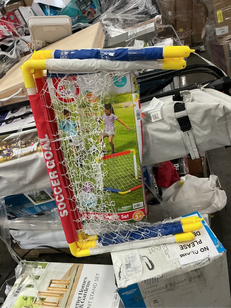 Condition photo showing As Is for play day foldable soccer set (2 folding goals, ball, inflating pump, & 4 stakes) children ages 3+