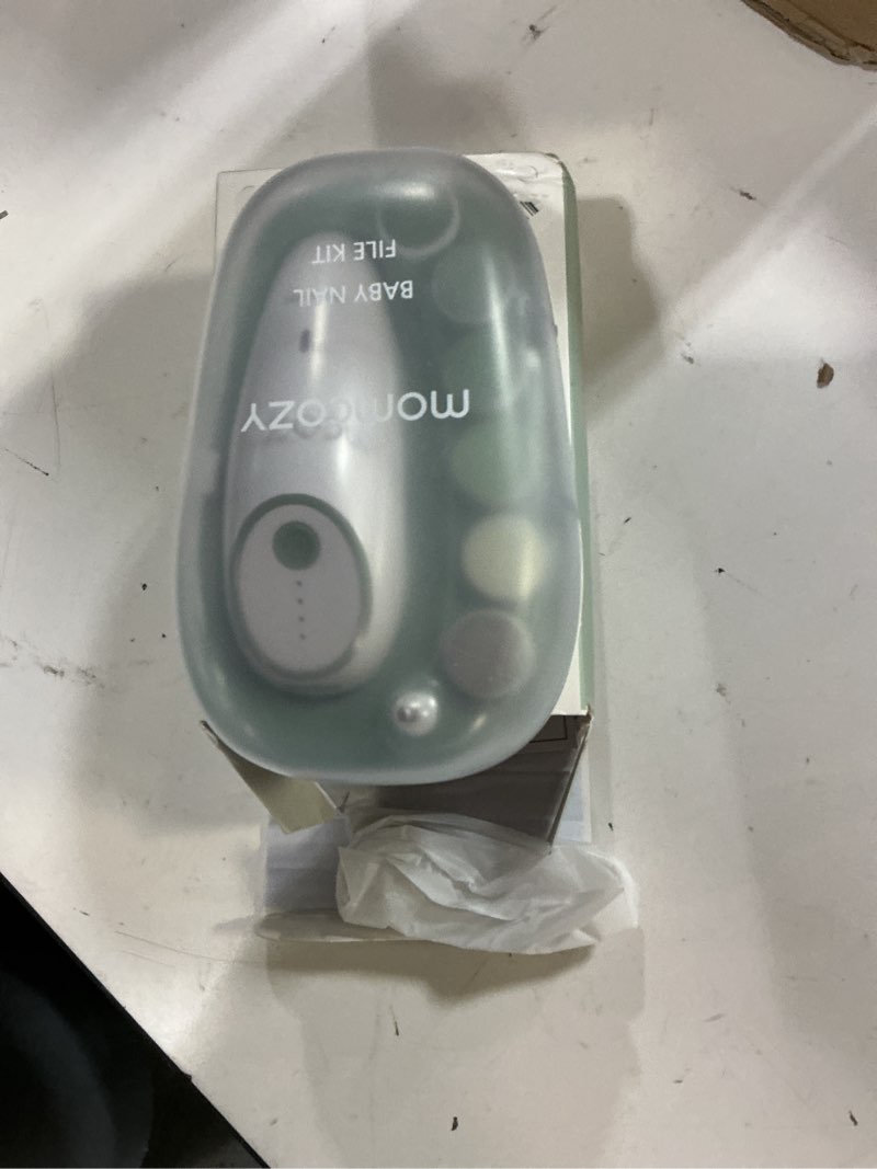 Condition photo showing Good Condition for momcozy baby nail file electric, gentle baby nail trimmer electric, baby nail clipper with night light, 7 grinding head replacement pads, green