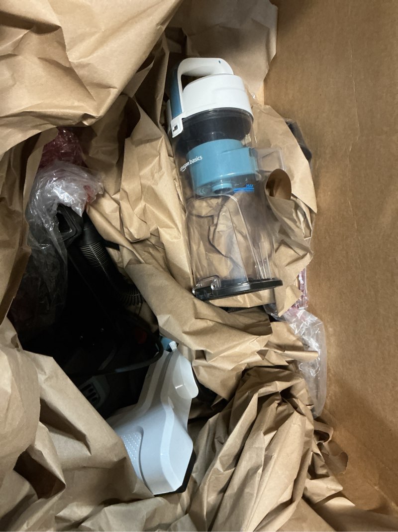 Condition photo showing As Is for Amazon Basics Upright Bagless Vacuum Cleaner for Carpet and Hard Floors, With Crevice and Upholstery Tools, Detachable Handle, Lightweight (8.4 lbs), 1.7L Dust Cup, 720W, 25ft Cord, Black/White