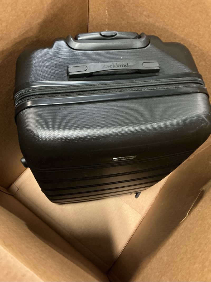 Condition photo showing Good Condition for Rockland Melbourne Hardside Expandable Spinner Wheel Luggage, Black, Checked Large 28" Checked Large 28" BLACK