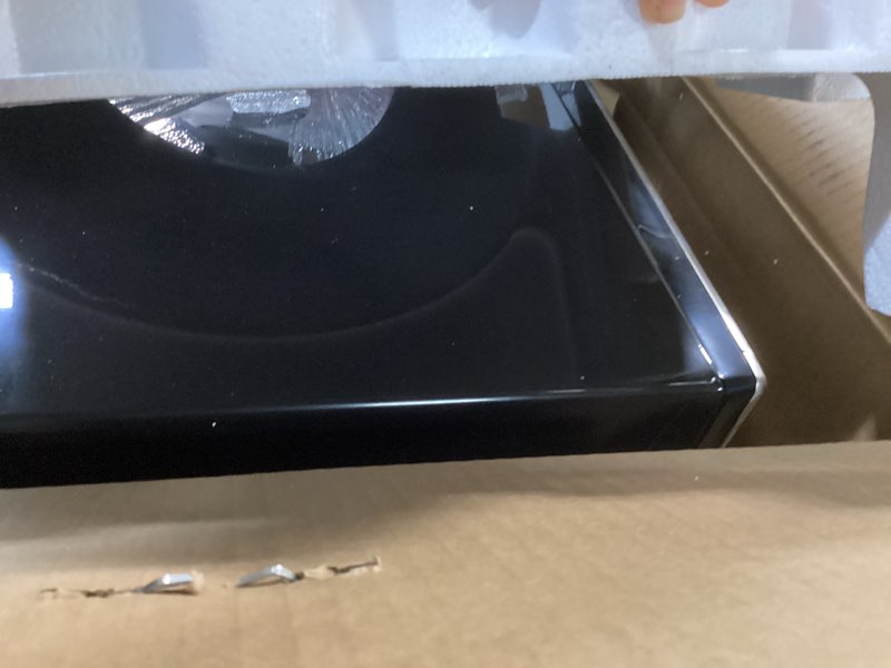 Condition photo showing As Is for ge countertop microwave oven,1, 200-watt capacity, 2.0 cubic ft., 8 auto setting cooking settings, child-lock technology, kitchen essentials for the countertop, dorm room or apartment, stainless steel 2.0 cu.ft. stainless steel