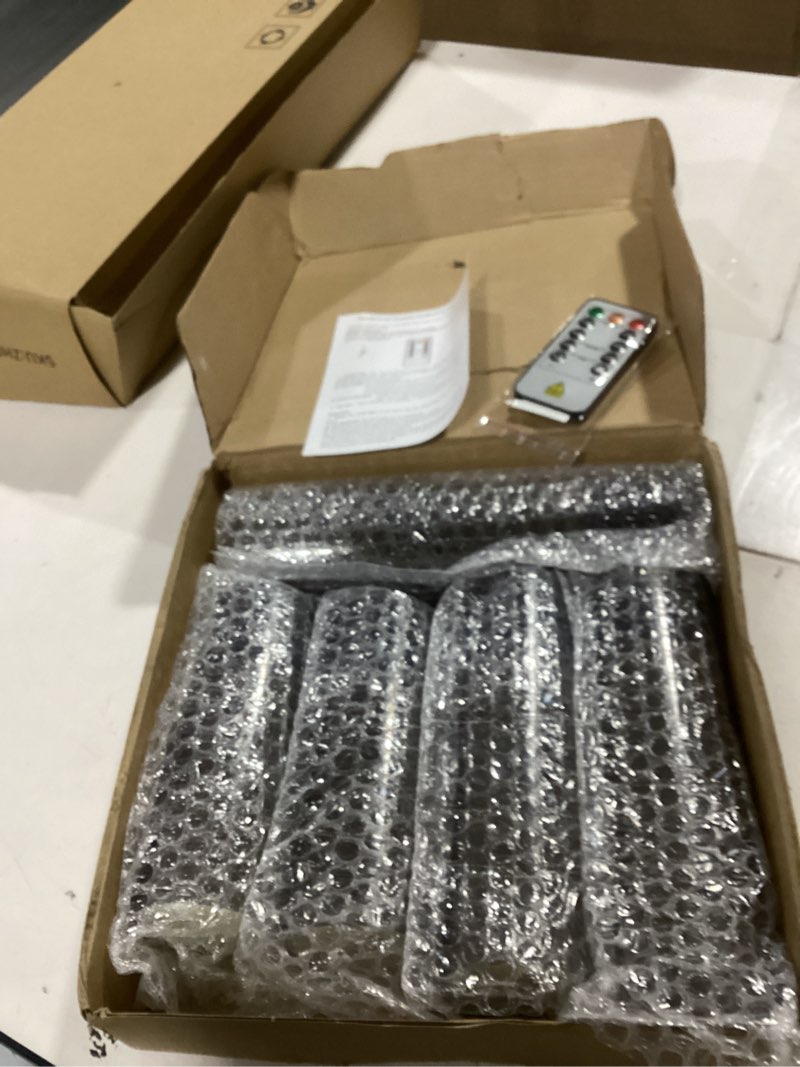 Condition photo showing New/Like New for flameless led candles with timer 5 pc flickering flameless candles for romantic ambiance and home decoration stable acrylic shell,with embedded star string?battery operated candles?grey? grey( pack of 5)