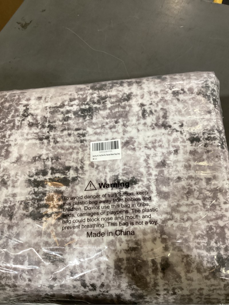 Condition photo showing New/Like New for ilango 8x10 modern area rug for living room ultra soft machine washable lightweight kid & pet friendly stain resistant non-shedding large carpet for bedroom dining room home office mat modern | grayish purple 8' x 10' (8'×10')