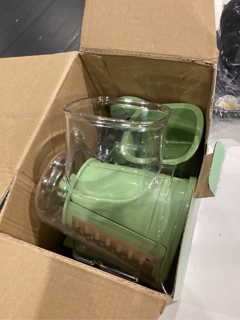 Condition photo showing As Is for SUSTEAS Rotary Cheese Grater with Handle - Vegetable Shredder with 5 Well-designed Blades & Strong Suction Base,Round Mandoline Slicer & Food Chopper for Kitchen,with Blade Storage Box(Retro Green)