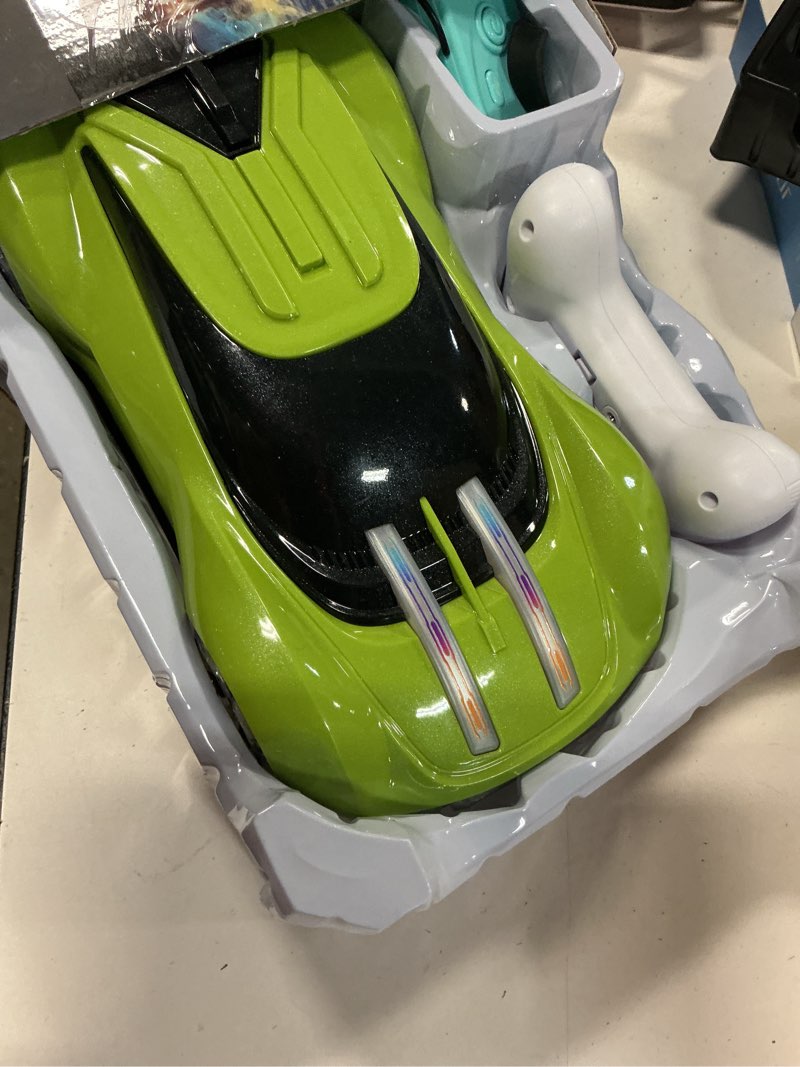 Condition photo showing New/Like New for dwi dowellin gesture sensing rc stunt car,drift remote control with light spray & music - boys toys age 6-8-12, cool birthday gifts for kids age 7 8 9 10 11 12 years old(green)