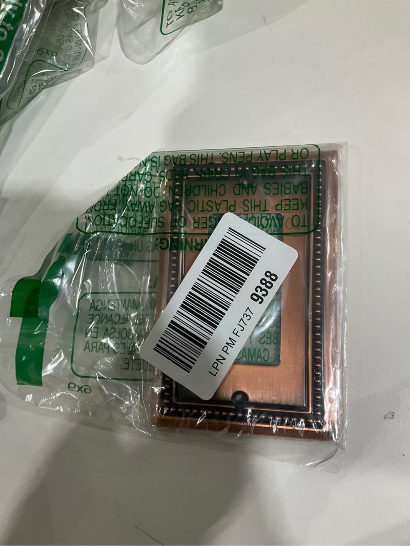 Condition photo showing As Is for Henne Bery Sunken Pearls Heavy Duty Decorative Wall Plate Switch Plate Outlet Cover (Single Decorator, 2 Pack, Antique Copper) Single Decorator 2PK Antique Copper only includes one 