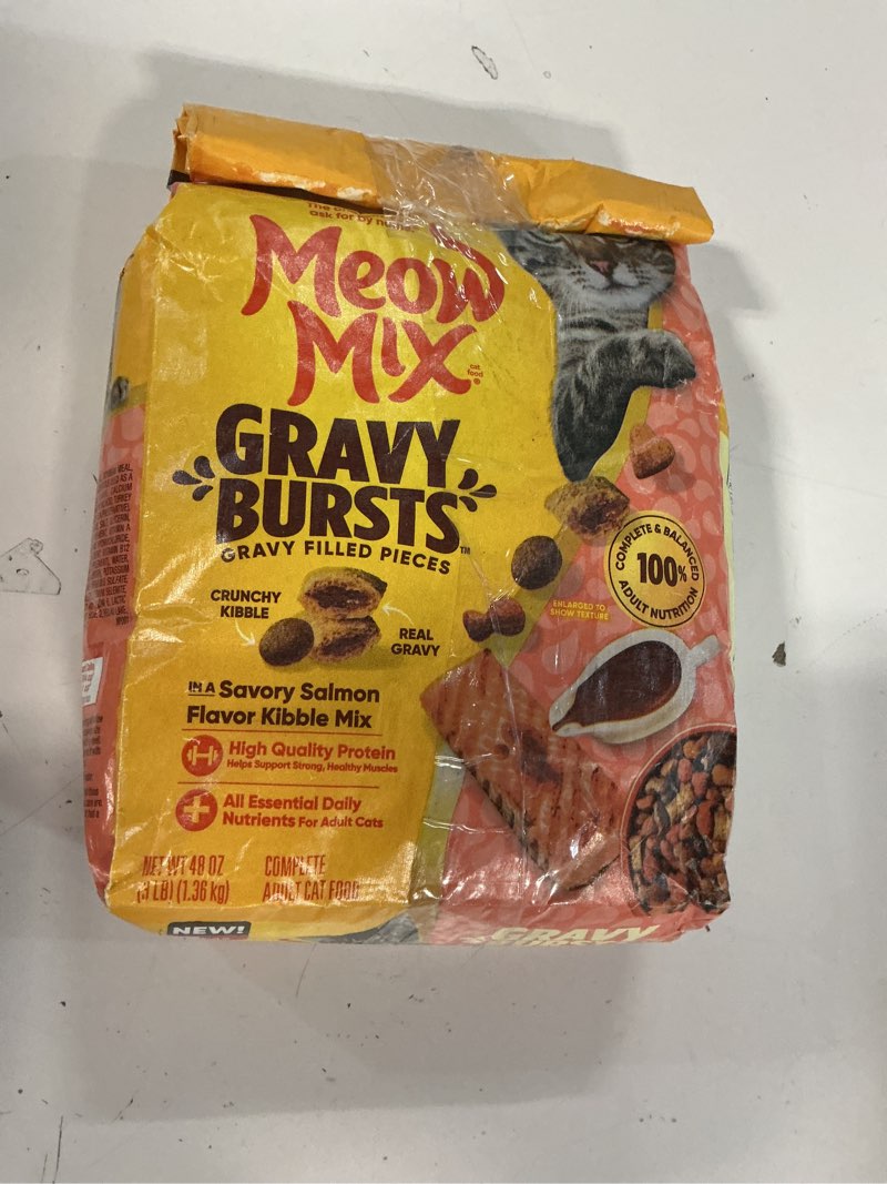 Condition photo showing As Is for (unknown best by date)meow mix gravy bursts, savory chicken flavor mix, gravy filled dry cat food, 3 lb. bag