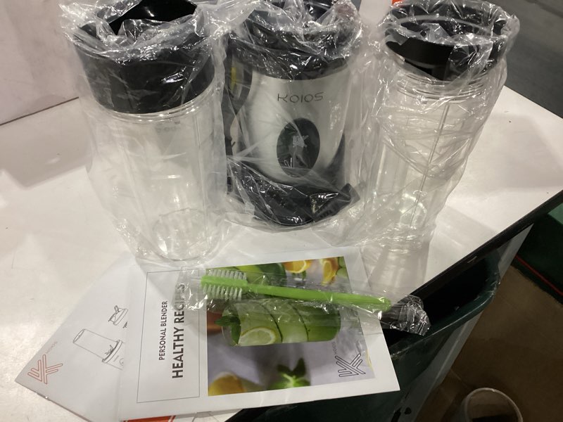Condition photo showing New/Like New for KOIOS Smoothie Blender, 900W Personal Blender for Shakes and Smoothies for Kitchen with 2 Portable Cups 22oz, Single Serve Smoothies Maker Mixer for Juices, Nutritious Recipe, Silver