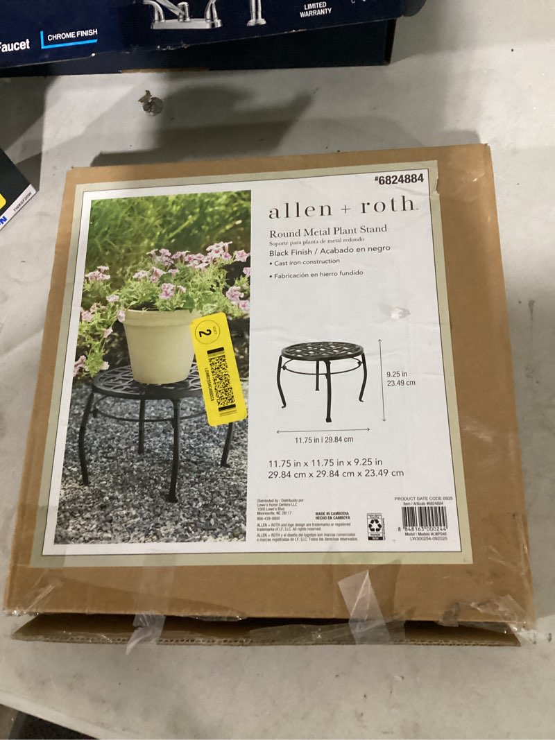 Condition photo showing As Is for allen + roth 9.06-in h x 11.81-in w black indoor/outdoor round cast iron plant stand 